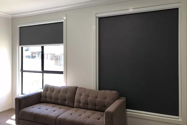 Living room with blackout blinds installed
