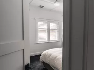 plantation shutters in bedroom